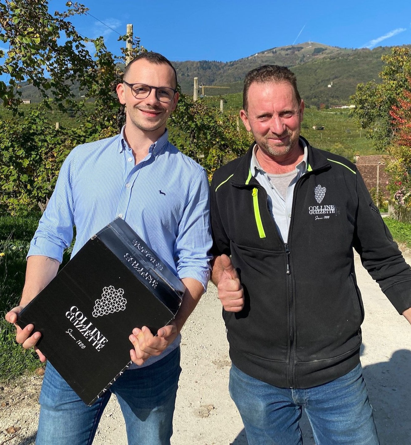 Sebastian mit Roberto in Prosecco Weinberge 